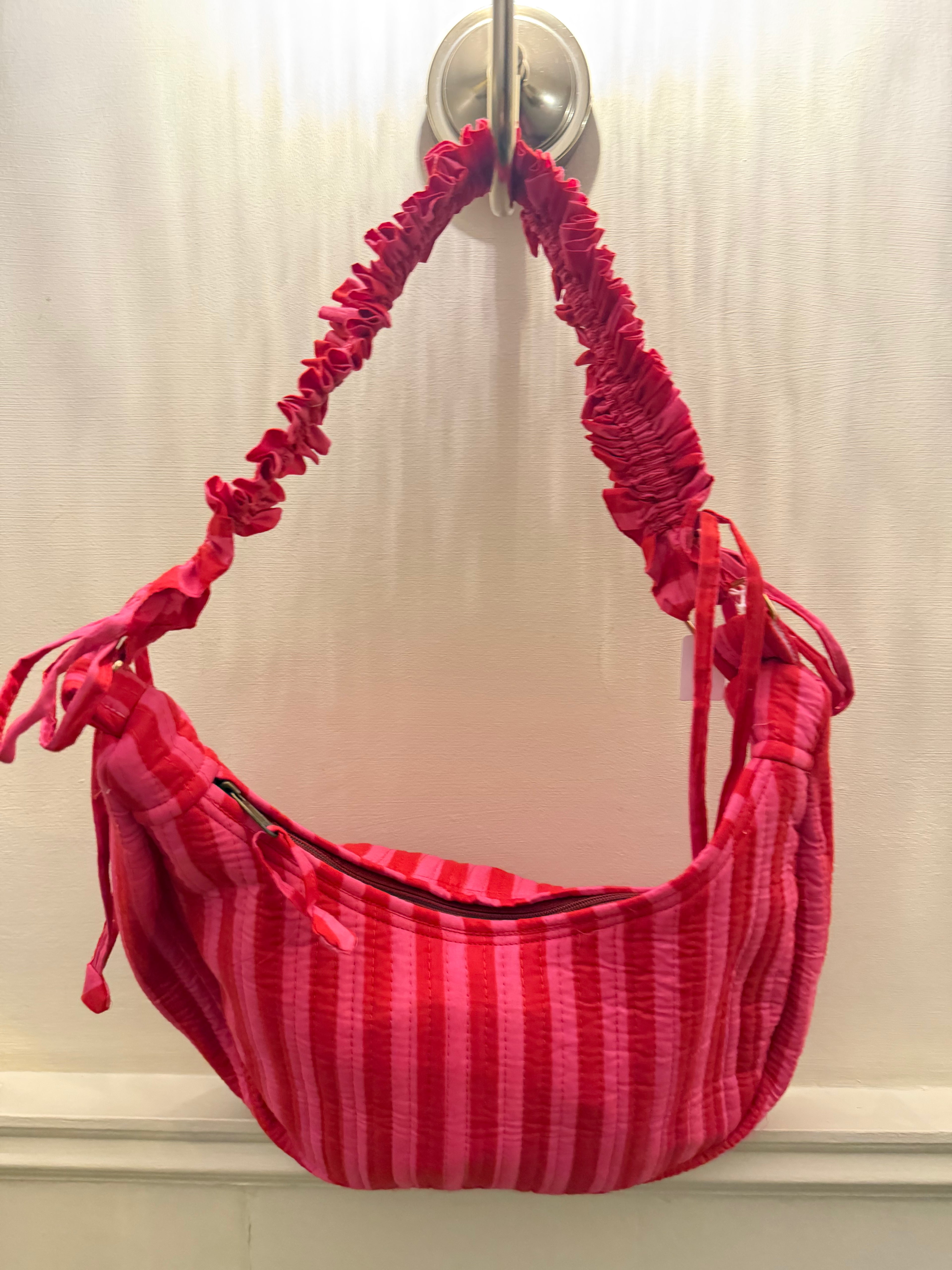 100% Cotton Handmade Frilly handle hand bag with zip closure.
