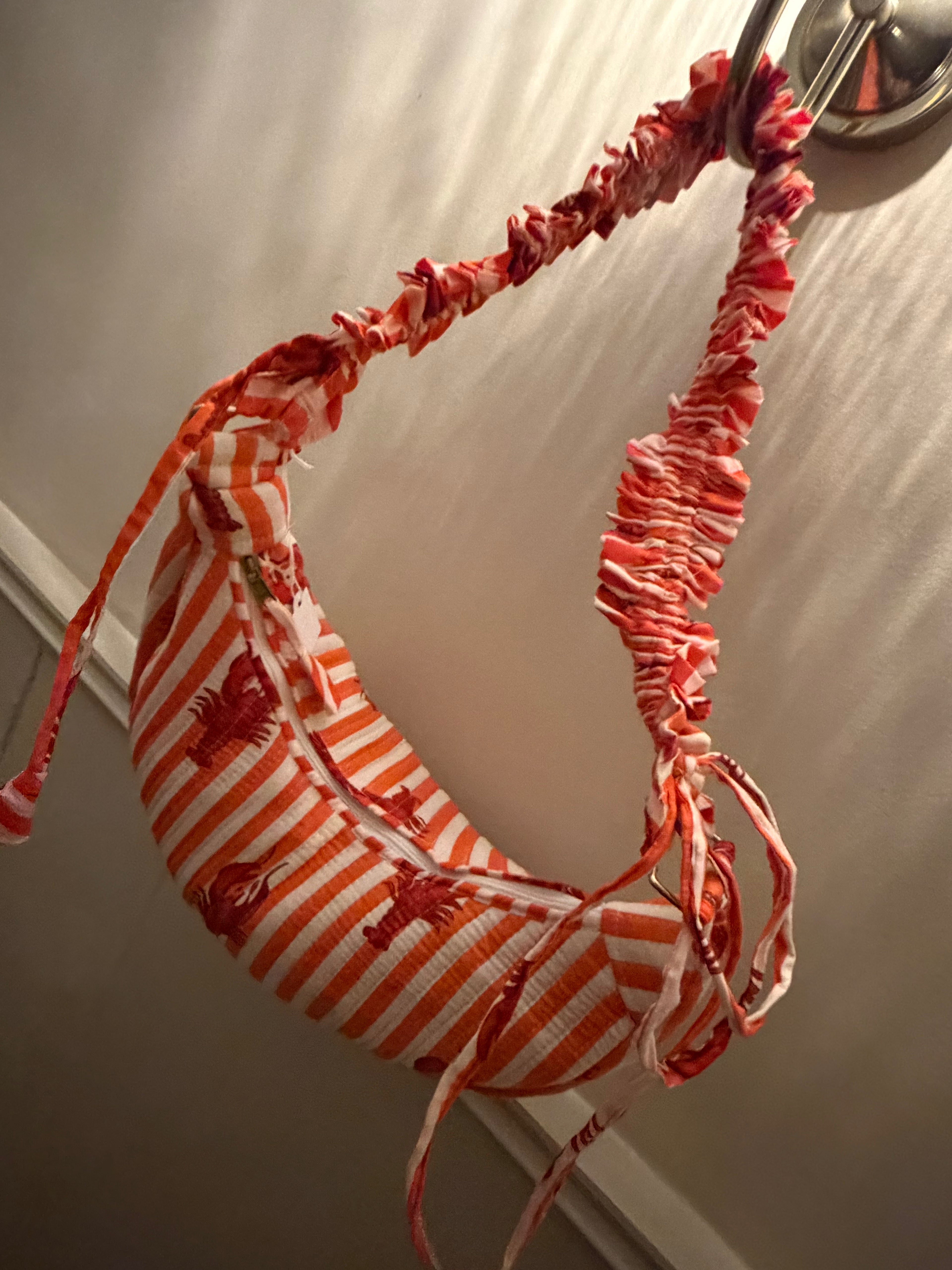100% Cotton Handmade Frilly handle hand bag with zip closure.